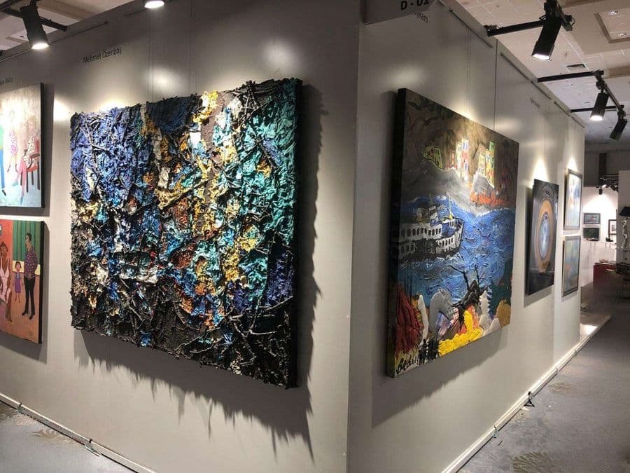 a wall with paintings on it